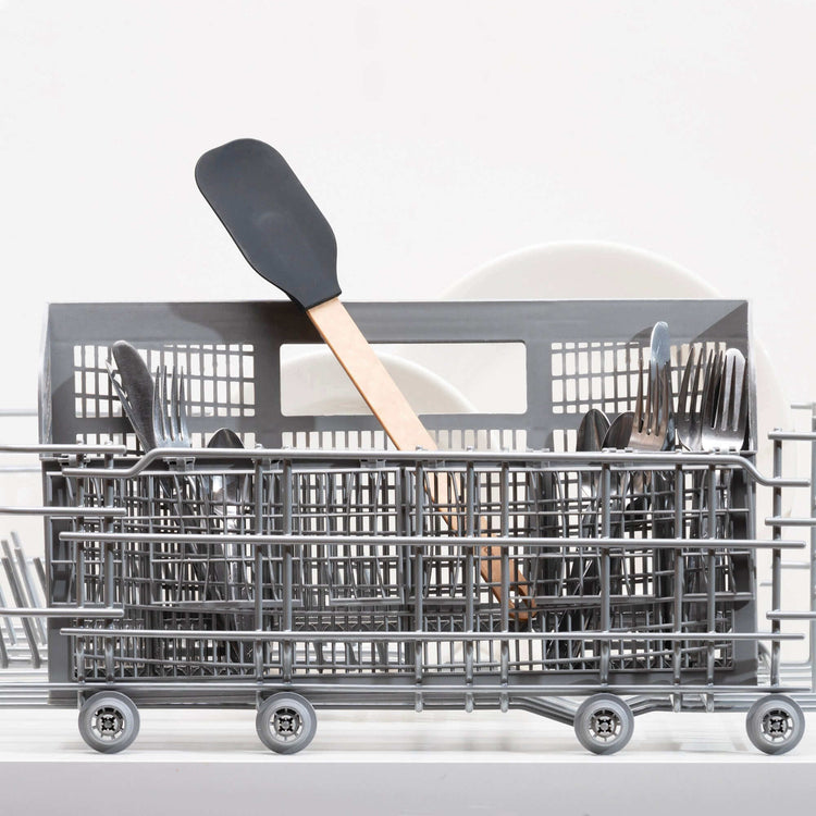  Epicurean Silicone Series Natural/Black Large Spoonula sitting in a dishwasher silverware basket